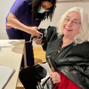 Member and Nurse doing blood pressure